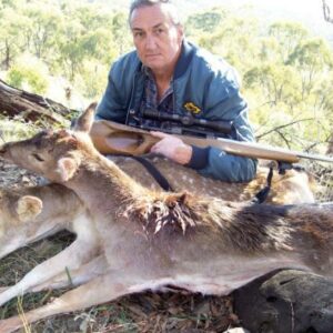 Author with two fallow shot at 250 yards using the new .303-25 improved that propelled the 100gn Speer SP at .257Wby Mag velocity. They went down without a kick and suffered catastrophic damage, shredding the chest cavity.