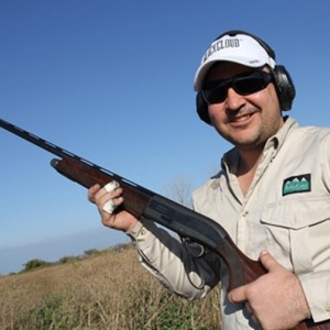 Laughing: Martin Bourke from Gun Pro, Dubbo, enjoys too much fun on NIOA's wing shoot in Argentina.