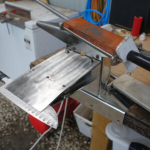 The Scary Sharp Precision Knife Sharpening System holds the blade at a constant angle.