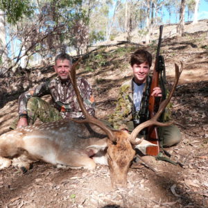 Tom and father Chris Burton with Tom'd buck,