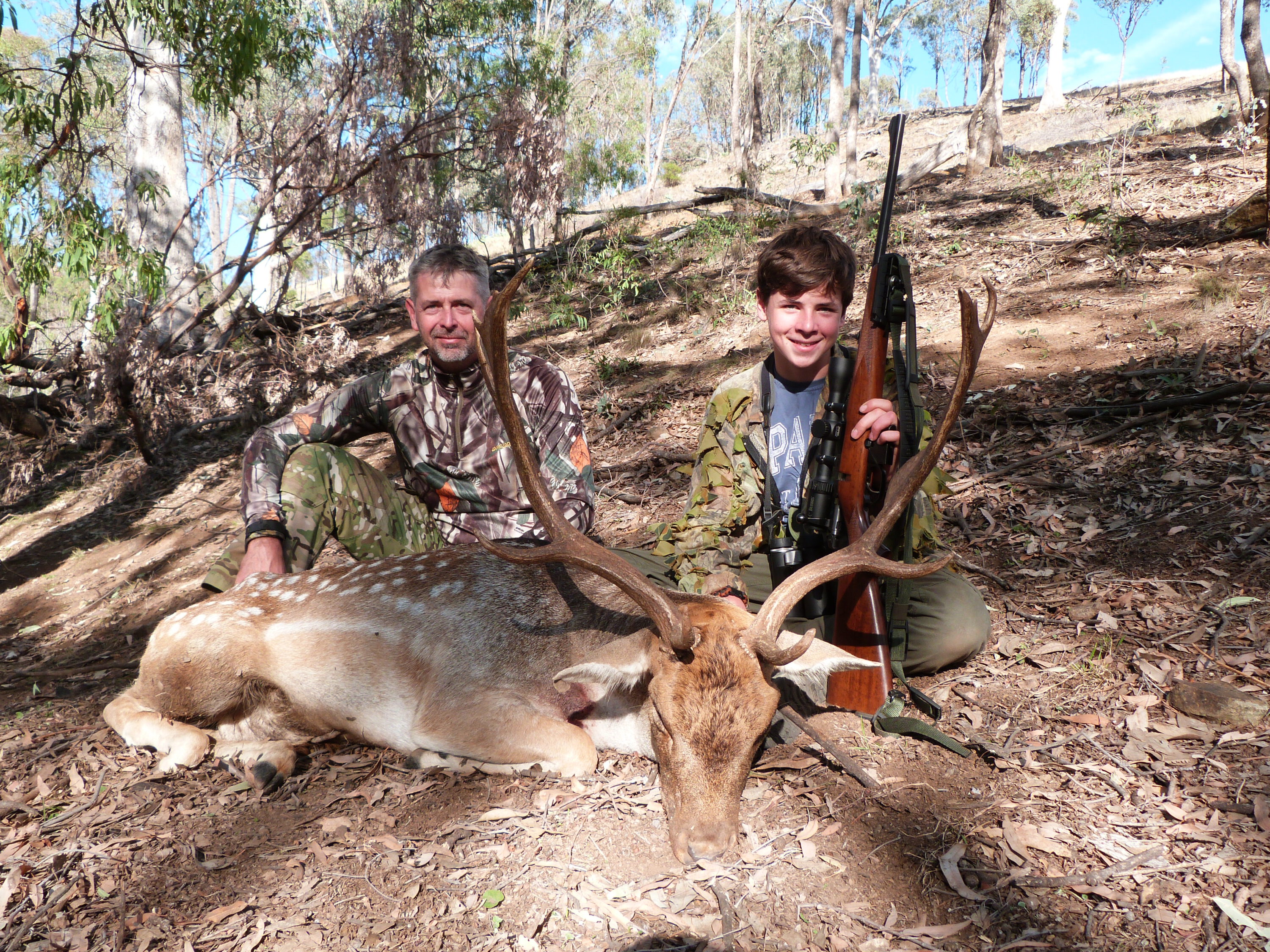 Tom and father Chris Burton with Tom'd buck,