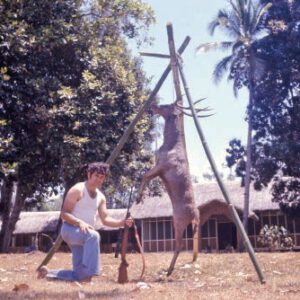 Improvised sapling tripod deer hoist