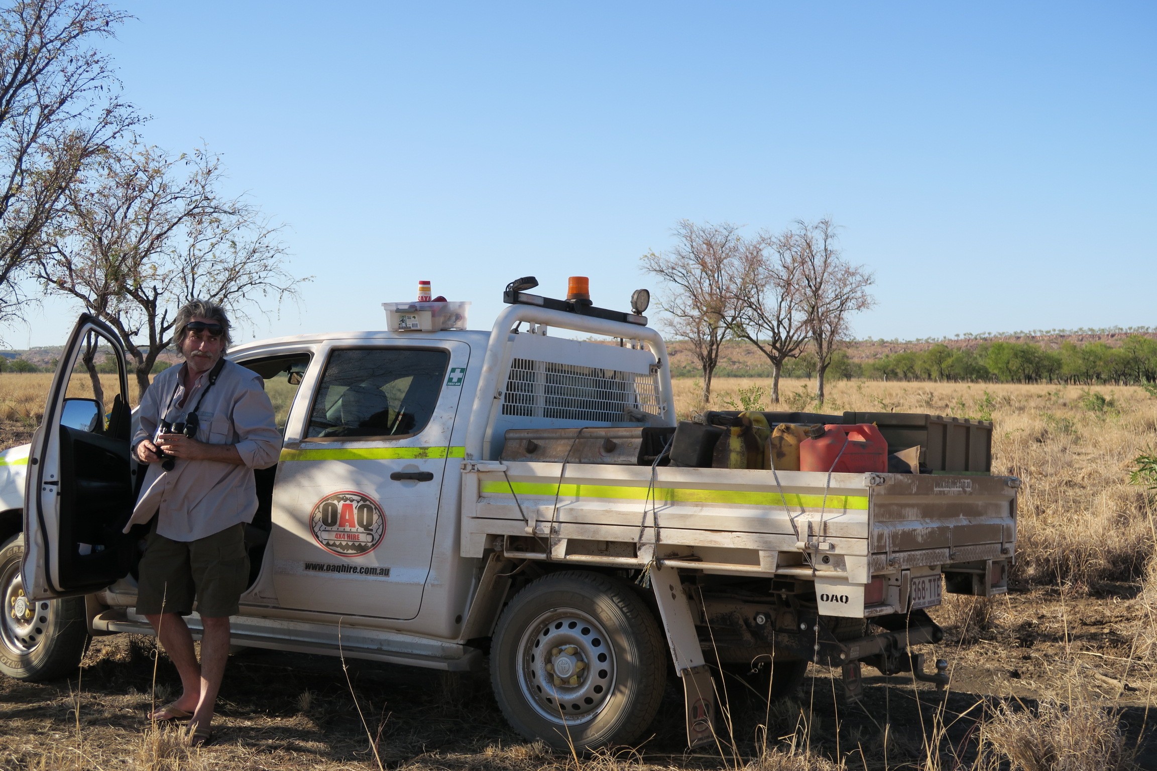 Neale emerging from our trusty hire vehicle to check out the bovines in the area.