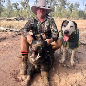 Pete Hayes, dog Hades and 78kg boar out near Roma QLD