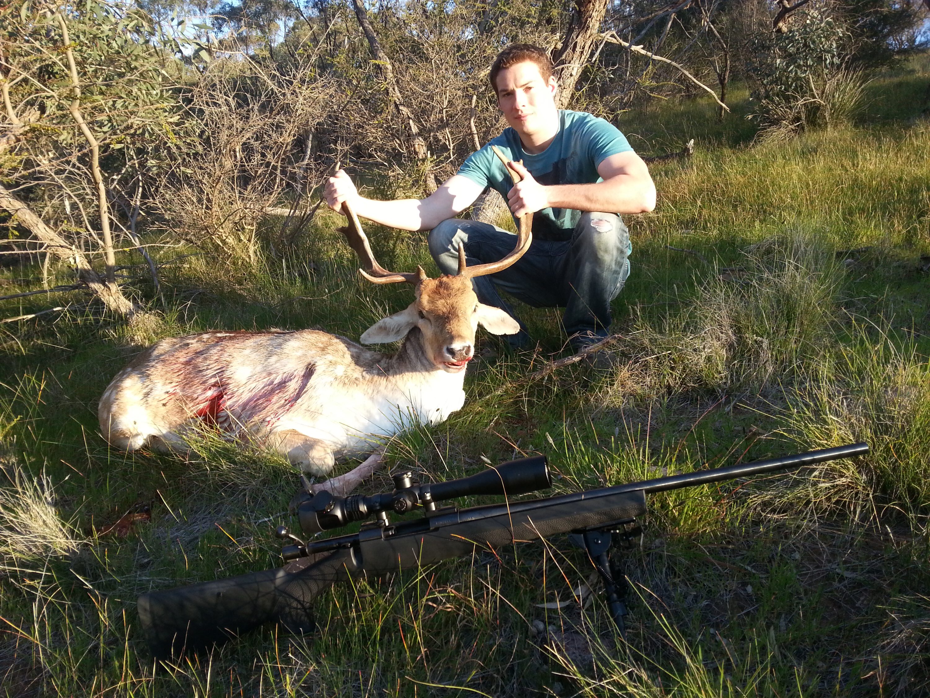 Tim with his buck and Howa .308.