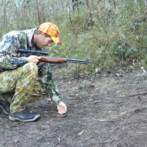 5. Hunting partner, Blake, is seen here feeling the ground to see how warm it is in an attempt to gauge how long it has been since the deer was asleep there.
