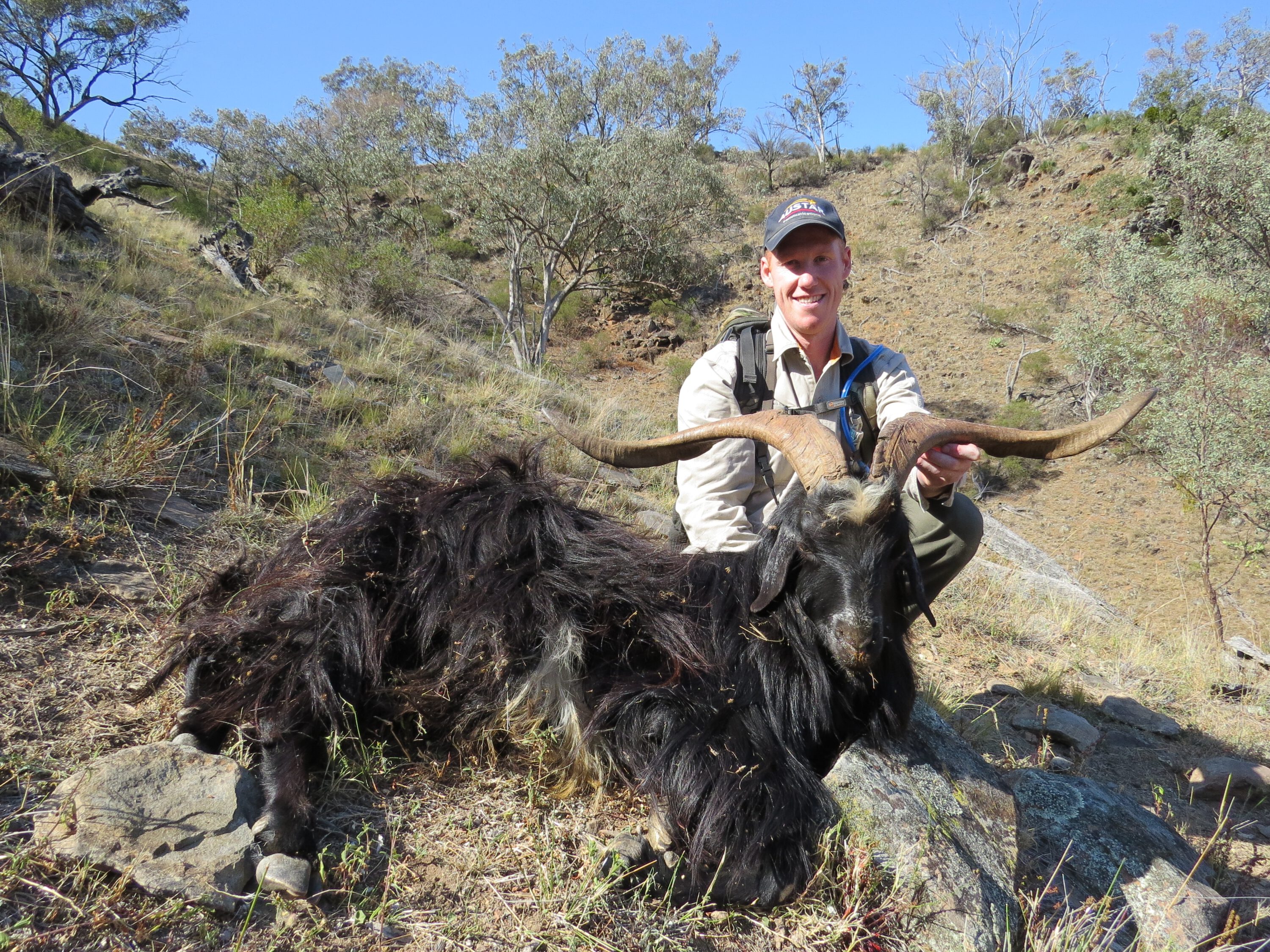 A magnificent jet-black billy with wide, thick horns was a great reward for Blake's effort.