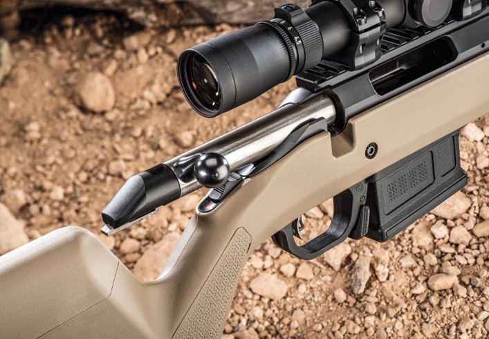 Action detail on a Flat Dark Earth version showing tang safety, 60-degree bolt lift and integral 20-mil Picatinny rail mount.