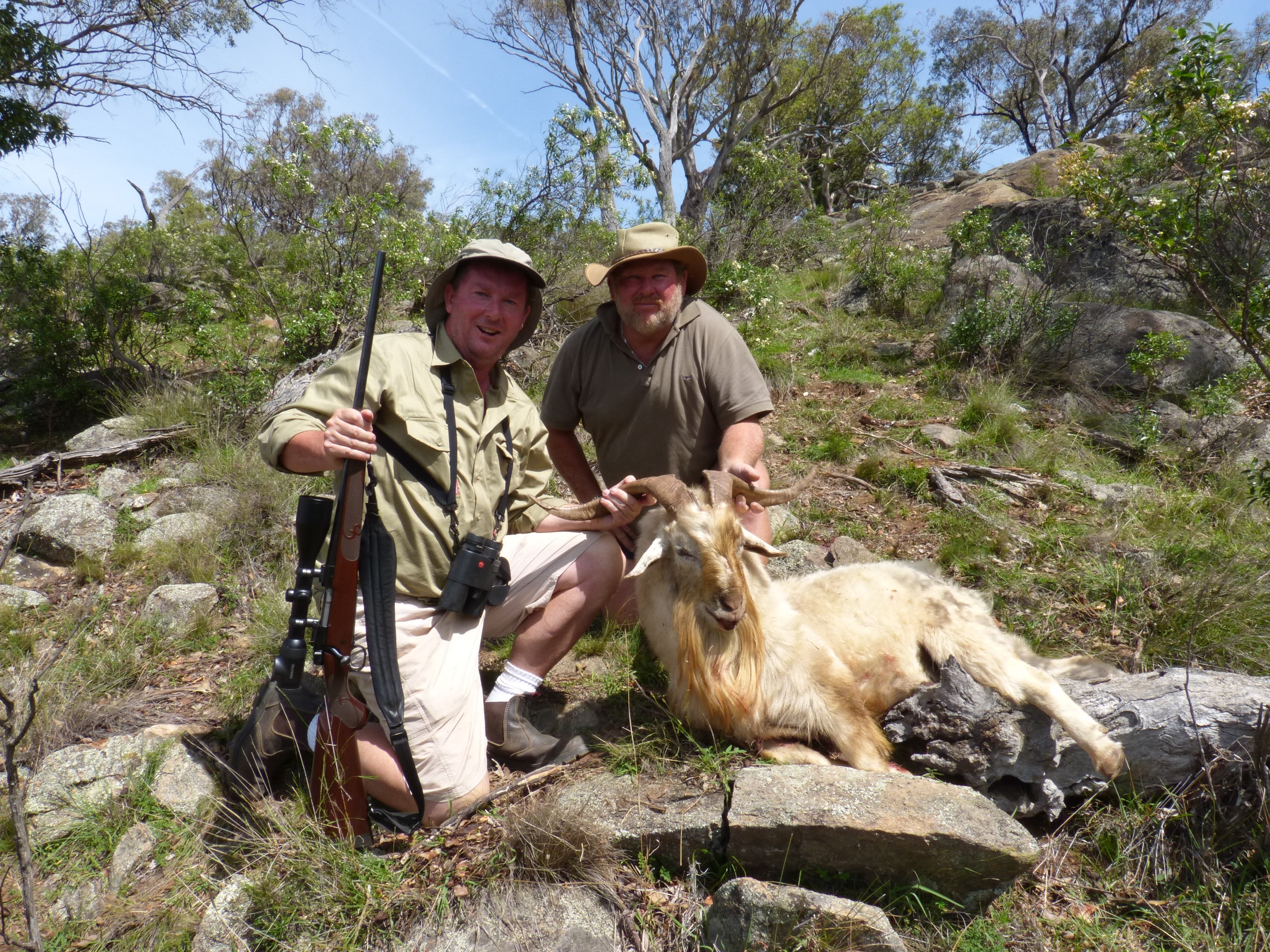 The author on the left with Scrub and the authors’ billy near the crest of the hill.