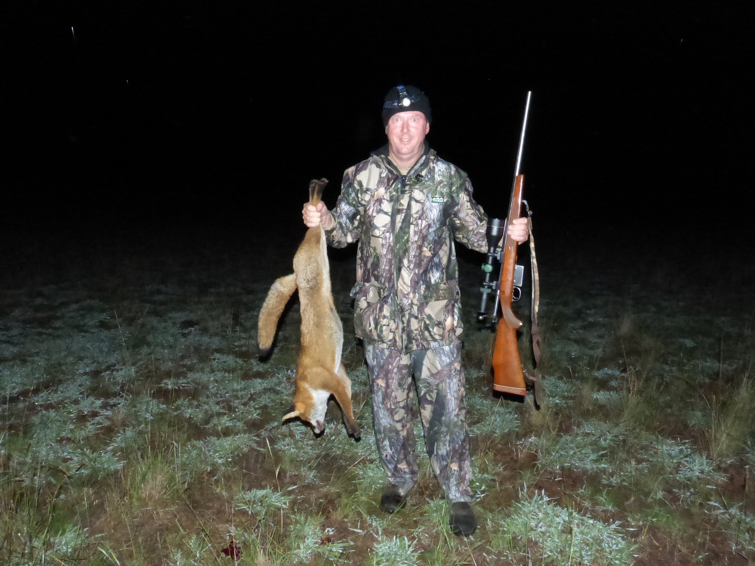 The author with the fox that nearly escaped behind a contour bank.