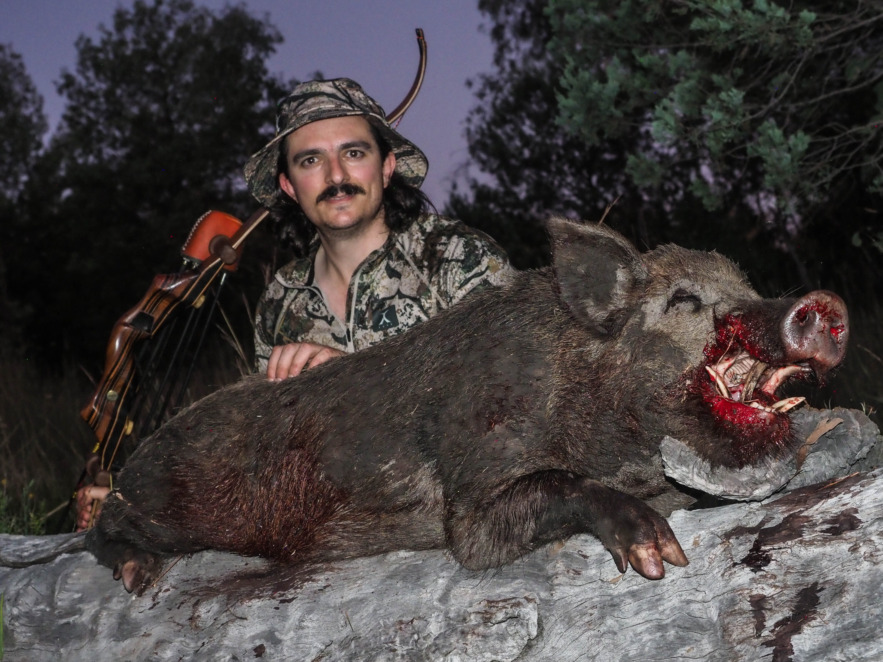 Dylan with a nice boar featured in his article, "With Stick And String"